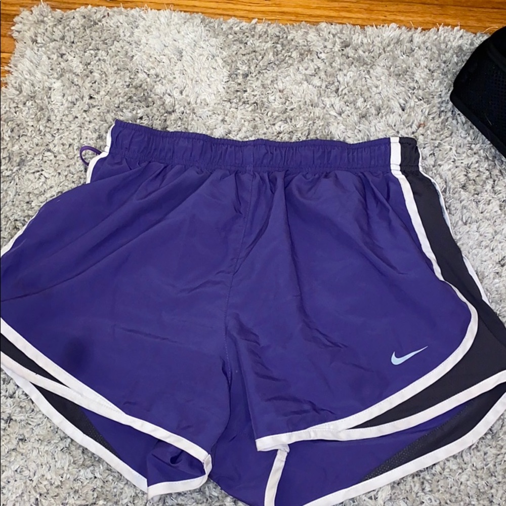 Purple Nike shorts